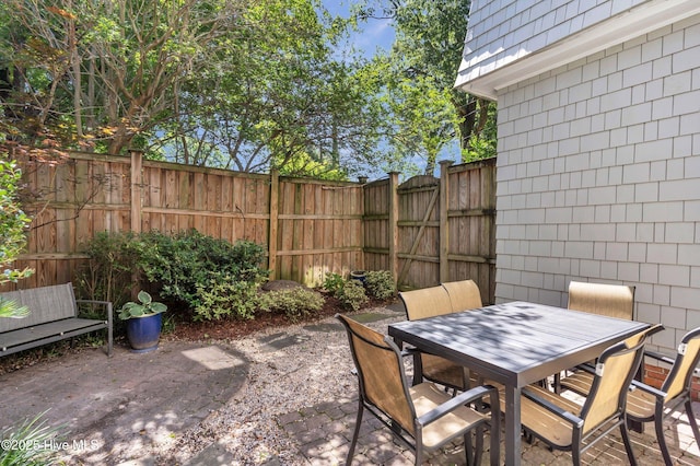 114 N 16th St, Wilmington, NC 28401 - fenced backyard featuring a patio area and outdoor dining space