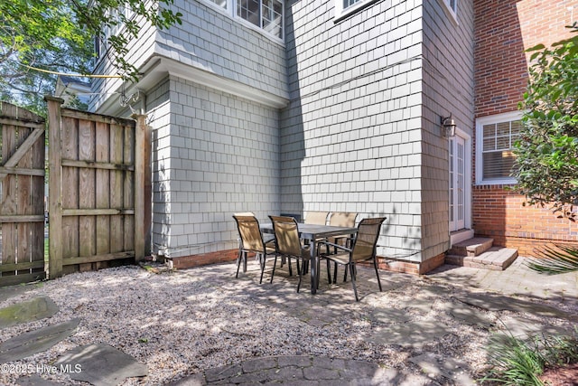 114 N 16th St, Wilmington, NC 28401 - view of patio / terrace featuring entry steps and outdoor dining area