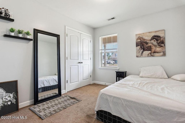 213 Lockwood Ct, Hubert, NC 28539 - carpeted bedroom with baseboards and a closet