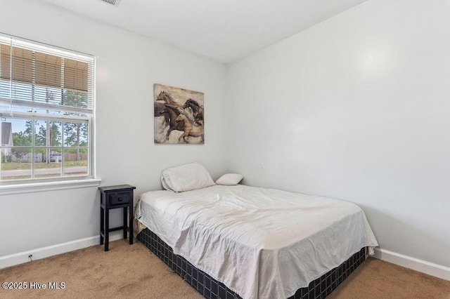213 Lockwood Ct, Hubert, NC 28539 - bedroom featuring carpet and baseboards