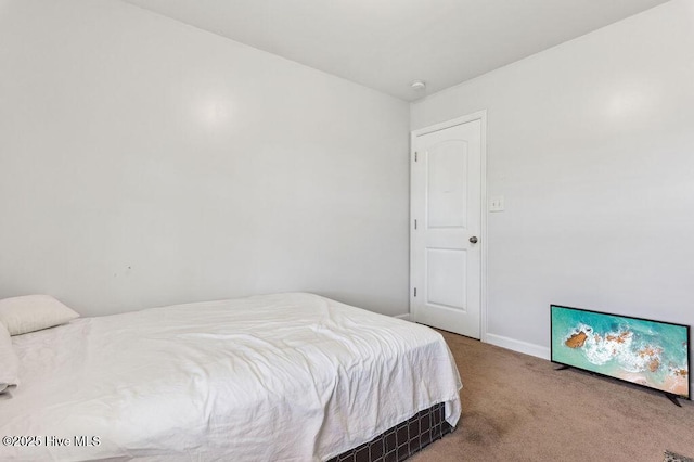 213 Lockwood Ct, Hubert, NC 28539 - carpeted bedroom featuring baseboards