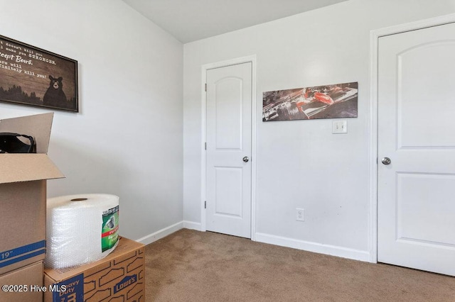 213 Lockwood Ct, Hubert, NC 28539 - carpeted bedroom featuring baseboards