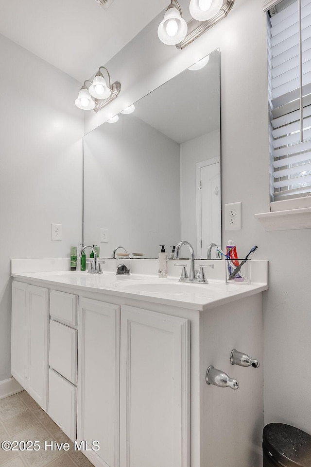 213 Lockwood Ct, Hubert, NC 28539 - bathroom with double vanity, tile patterned floors, and toilet