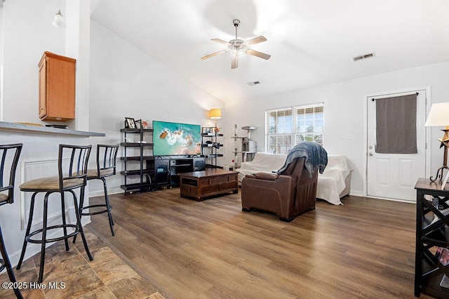 213 Lockwood Ct, Hubert, NC 28539 - living area with a ceiling fan, vaulted ceiling, wood finished floors, and baseboards