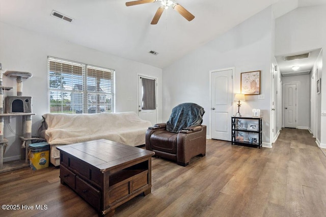 213 Lockwood Ct, Hubert, NC 28539 - living area featuring a ceiling fan, vaulted ceiling, wood finished floors, and baseboards