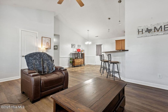 213 Lockwood Ct, Hubert, NC 28539 - living room with ceiling fan, wood finished floors, high vaulted ceiling, and baseboards