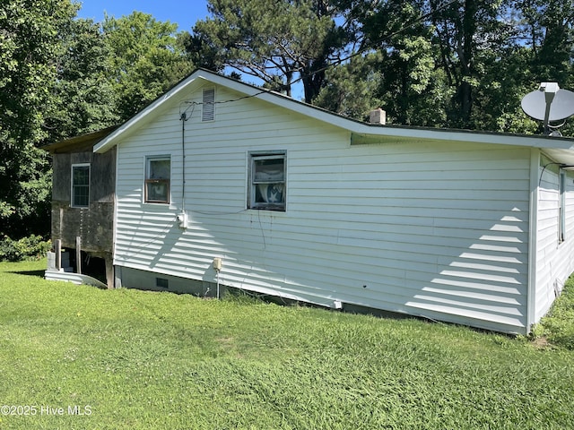 512 Walton Ln, Tyner, NC 27980 - view of side of property featuring a lawn and crawl space