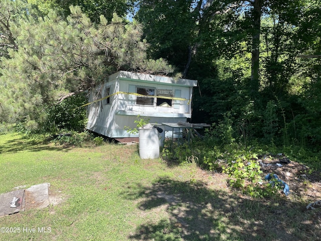 512 Walton Ln, Tyner, NC 27980 - exterior space with a forest