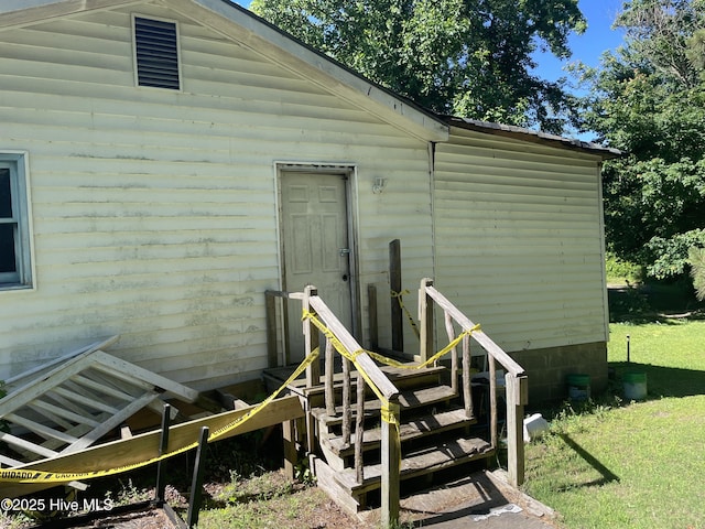 512 Walton Ln, Tyner, NC 27980 - rear view of property with a lawn and entry steps