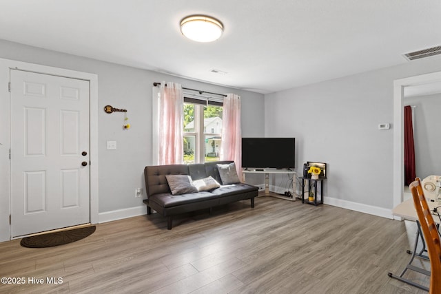 406 Walnut St, Elizabeth City, NC 27909 - living area with wood finished floors and baseboards