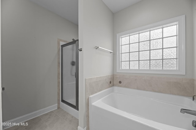 2001 Snapper St, New Bern, NC 28562 - full bath with a bath, a stall shower, and tile patterned flooring