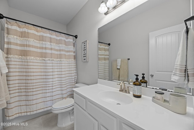 2001 Snapper St, New Bern, NC 28562 - full bath featuring toilet, vanity, tile patterned floors, and a shower with shower curtain