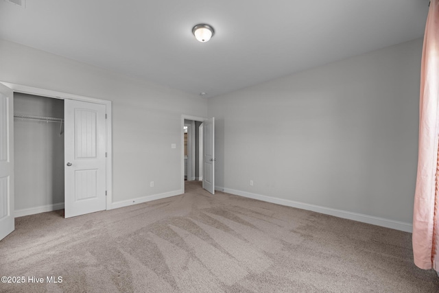 2001 Snapper St, New Bern, NC 28562 - unfurnished bedroom featuring carpet floors, baseboards, and a closet