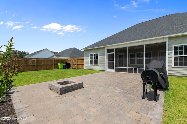 2001 Snapper St, New Bern, NC 28562 - view of patio / terrace featuring a sunroom, a fire pit, and area for grilling