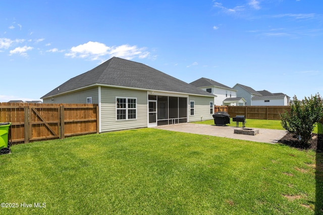 2001 Snapper St, New Bern, NC 28562 - back of house with a fire pit, a patio, a sunroom, and a shingled roof