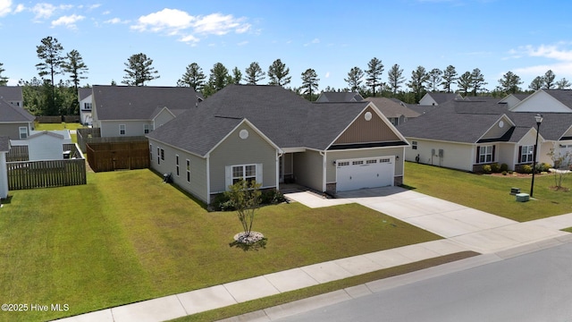 2001 Snapper St, New Bern, NC 28562 - view of front of property featuring concrete driveway, a garage, a residential view, and roof with shingles