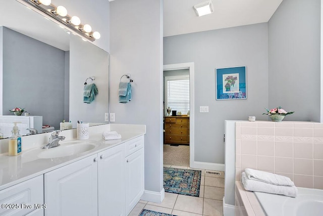 3212 Wexford Way, Southport, NC 28461 - full bath featuring vanity, a bathtub, and tile patterned flooring