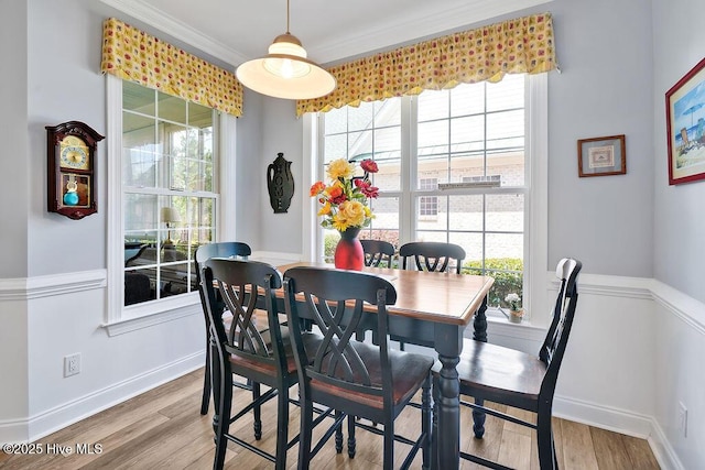 3212 Wexford Way, Southport, NC 28461 - dining area featuring light wood finished floors and crown molding