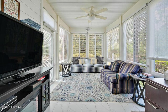 3212 Wexford Way, Southport, NC 28461 - sunroom / solarium featuring marble look tile flooring
