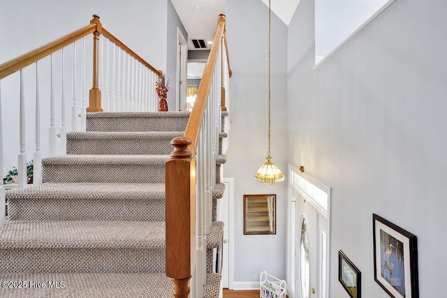 3212 Wexford Way, Southport, NC 28461 - stairs featuring a high ceiling