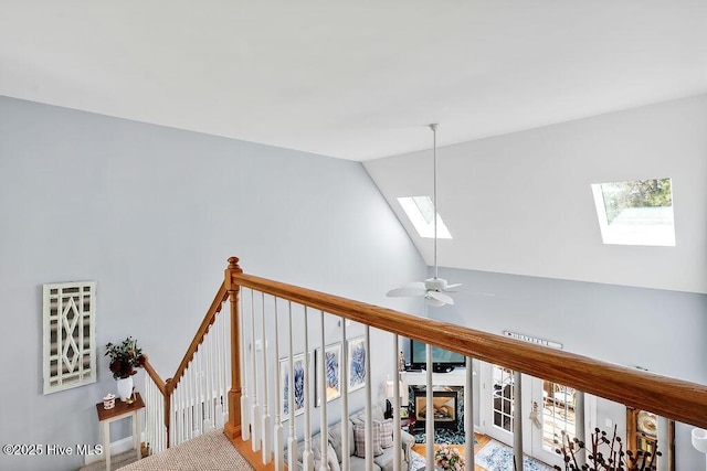 3212 Wexford Way, Southport, NC 28461 - hall featuring a skylight, vaulted ceiling, and an upstairs landing