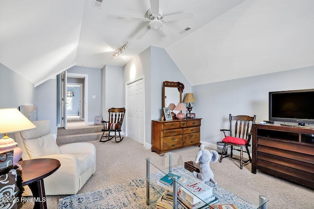 3212 Wexford Way, Southport, NC 28461 - carpeted living area featuring lofted ceiling, a ceiling fan, and rail lighting