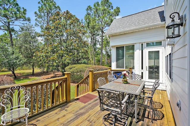 3212 Wexford Way, Southport, NC 28461 - wooden terrace with outdoor dining area