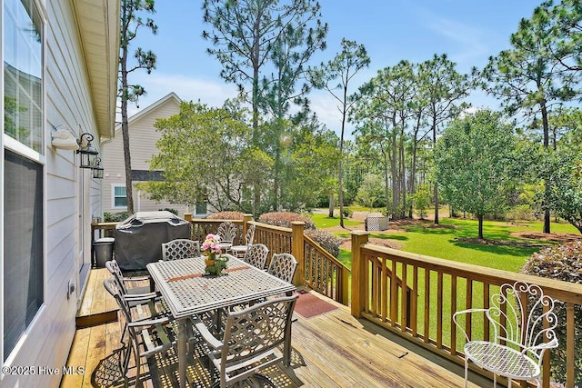 3212 Wexford Way, Southport, NC 28461 - wooden deck featuring a yard and outdoor dining area