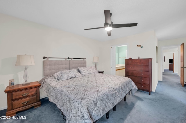 728 Azalea Dr Unit 426, Hampstead, NC 28443 - bedroom with carpet flooring, ceiling fan, and ensuite bath
