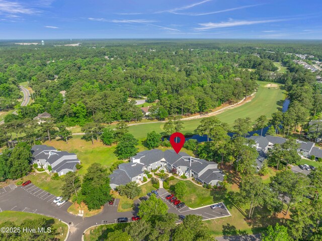 728 Azalea Dr Unit 426, Hampstead, NC 28443 - aerial view of property and surrounding area with a heavily wooded area, nearby suburban area, and a golf club