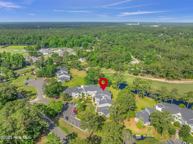 728 Azalea Dr Unit 426, Hampstead, NC 28443 - aerial view of property's location featuring a heavily wooded area and nearby suburban area