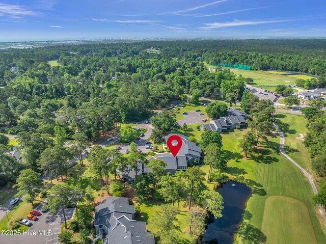 728 Azalea Dr Unit 426, Hampstead, NC 28443 - aerial view of a heavily wooded area, a local golf course, and a large body of water