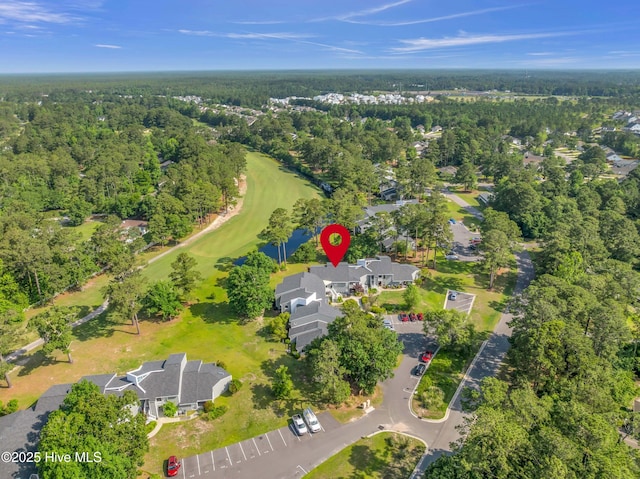 728 Azalea Dr Unit 426, Hampstead, NC 28443 - aerial view of property's location with a golf club, nearby suburban area, and a heavily wooded area
