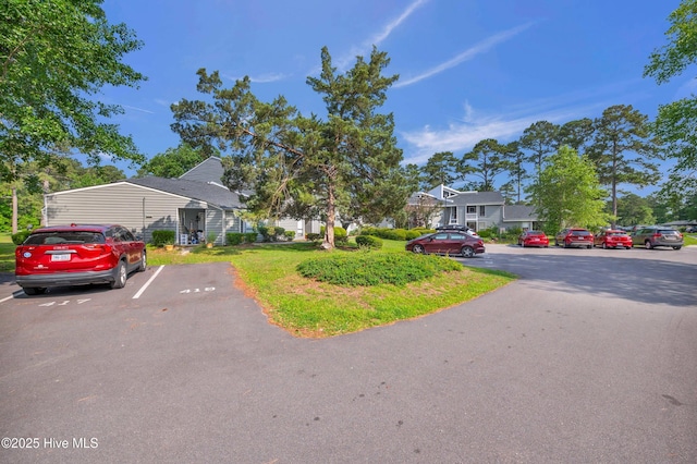 728 Azalea Dr Unit 426, Hampstead, NC 28443 - view of front of home featuring uncovered parking