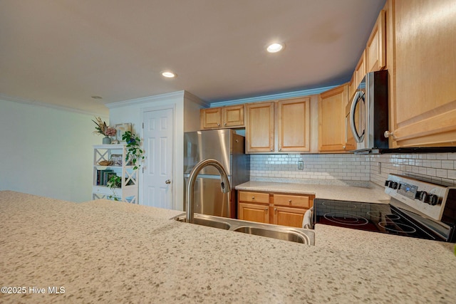 909 Carolina Beach Ave N Unit 2B, Carolina Beach, NC 28428 - kitchen featuring appliances with stainless steel finishes, ornamental molding, light countertops, a sink, and tasteful backsplash
