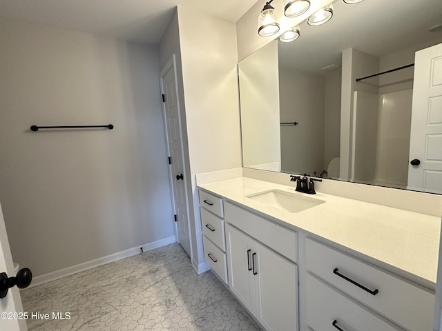 8288 Paramount Pt, Winnabow, NC 28479 - bathroom with vanity, baseboards, and a shower