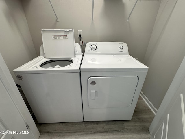 8288 Paramount Pt, Winnabow, NC 28479 - washroom featuring independent washer and dryer and wood finished floors