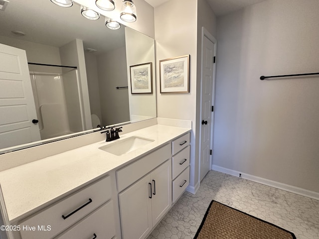 8288 Paramount Pt, Winnabow, NC 28479 - full bathroom featuring vanity, a shower, baseboards, and tile patterned flooring