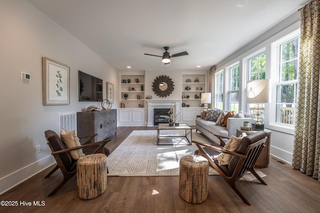 1004 Fawn Valley Way, Wilmington, NC 28409 - living room with a ceiling fan, dark wood-style flooring, a glass covered fireplace, baseboards, and recessed lighting
