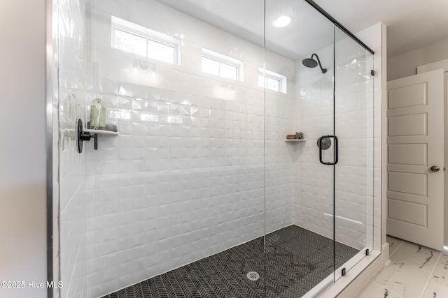 1004 Fawn Valley Way, Wilmington, NC 28409 - bathroom featuring plenty of natural light, a stall shower, and marble finish floors