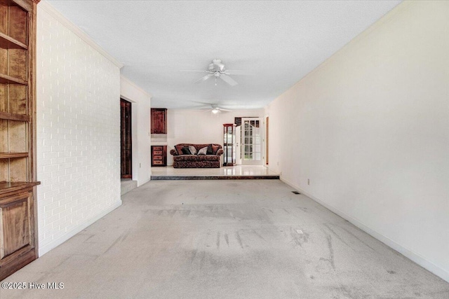 102 Trollingwood Dr, Goldsboro, NC 27534 - unfurnished living room featuring carpet, a ceiling fan, and baseboards