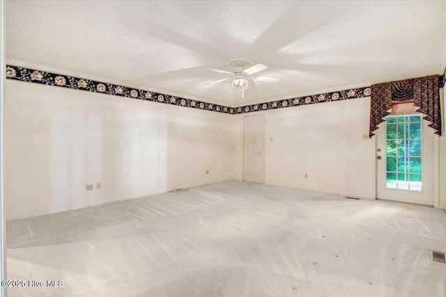 102 Trollingwood Dr, Goldsboro, NC 27534 - empty room with a ceiling fan, light carpet, and crown molding