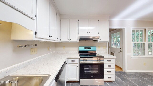 165 Sandhurst Pl, Southern Pines, NC 28387 - kitchen featuring appliances with stainless steel finishes, under cabinet range hood, white cabinetry, ornamental molding, and light stone counters
