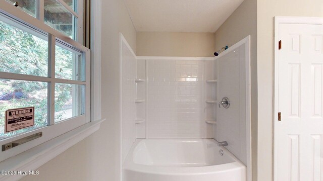165 Sandhurst Pl, Southern Pines, NC 28387 - bathroom featuring plenty of natural light and bathtub / shower combination