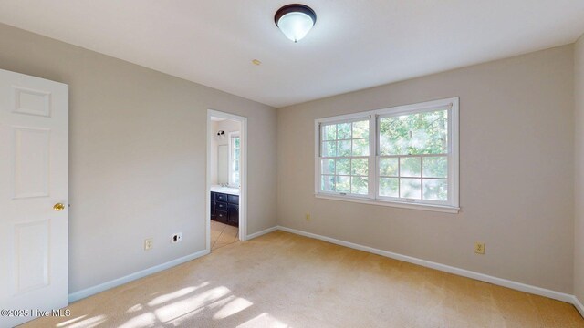 165 Sandhurst Pl, Southern Pines, NC 28387 - empty room with light colored carpet and baseboards