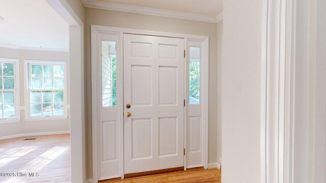 165 Sandhurst Pl, Southern Pines, NC 28387 - entryway with ornamental molding, baseboards, and light wood-style floors