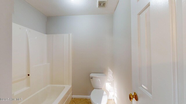 165 Sandhurst Pl, Southern Pines, NC 28387 - bathroom featuring tile patterned flooring, toilet, baseboards, and shower / washtub combination