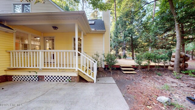 165 Sandhurst Pl, Southern Pines, NC 28387 - entrance to property with a chimney