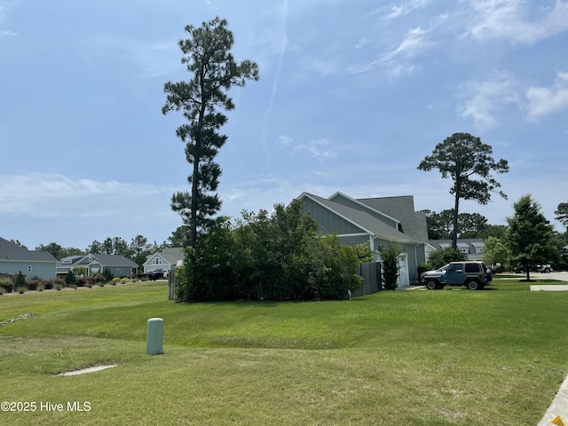 8395 Penny Royal Ln, Wilmington, NC 28412 - view of grassy yard featuring a residential view