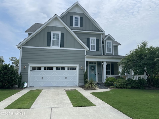 8395 Penny Royal Ln, Wilmington, NC 28412 - craftsman-style house with board and batten siding, concrete driveway, covered porch, a front lawn, and a garage